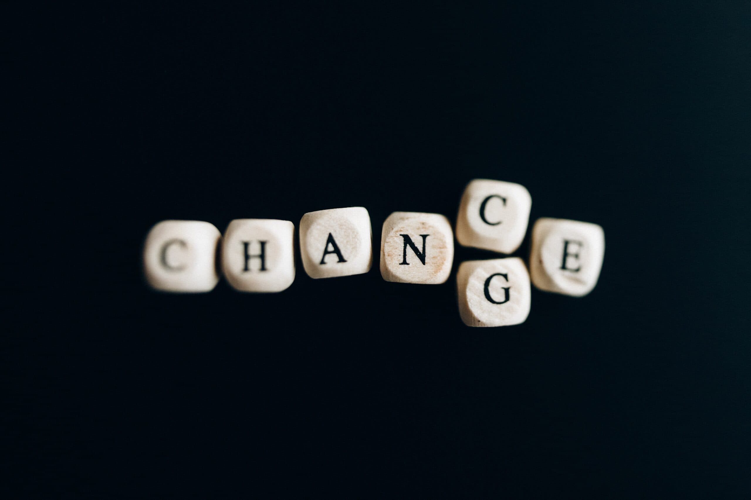 Image of dice with letters on them spelling out Change and Chance