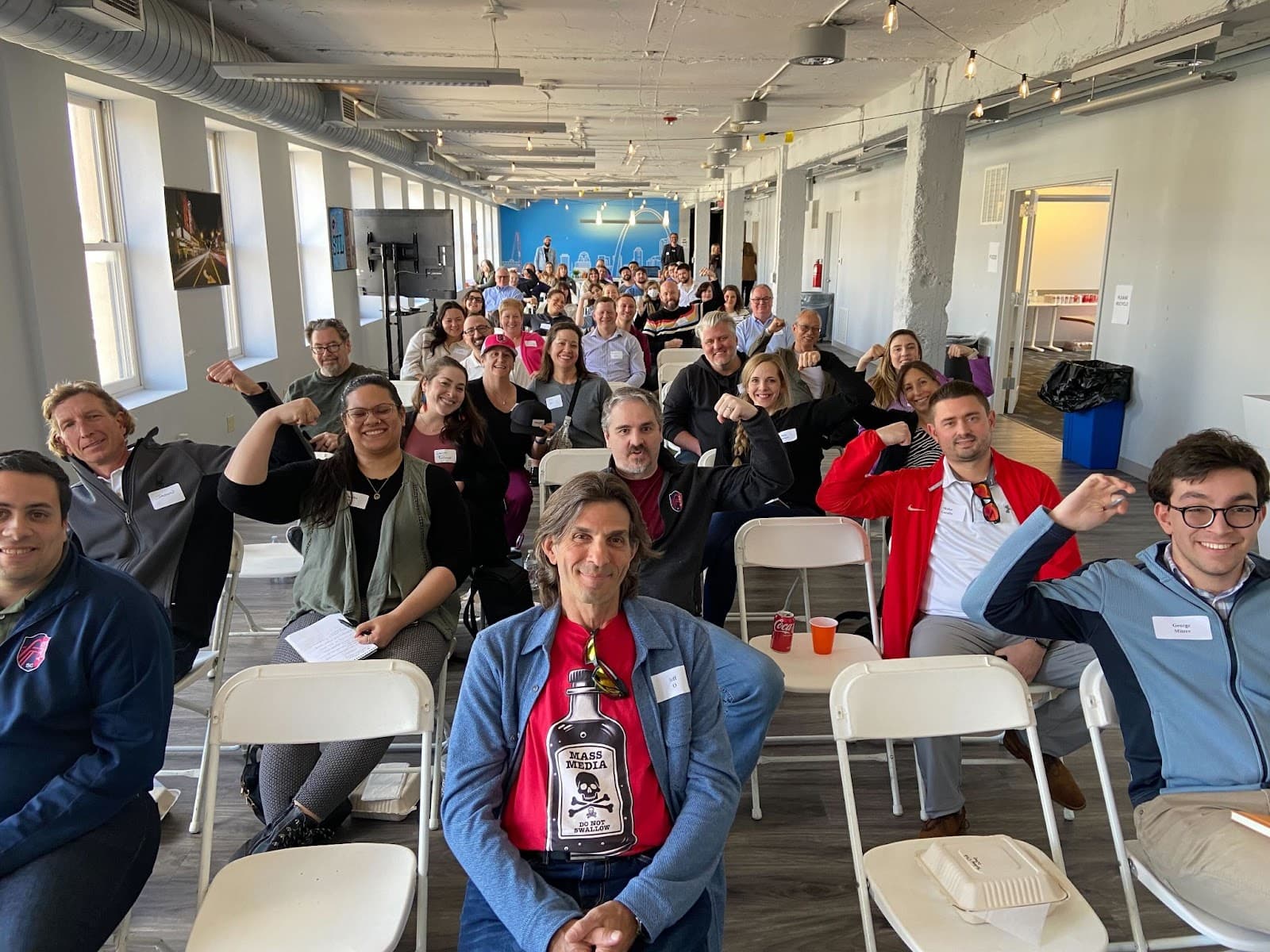 Lunch-and-learn attendees smiling for a group photo