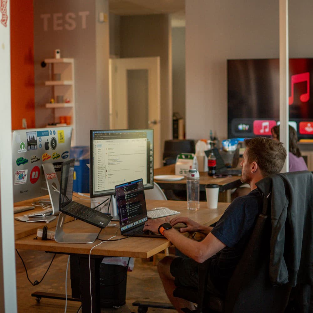 A developer at work in the IntegrityXD office