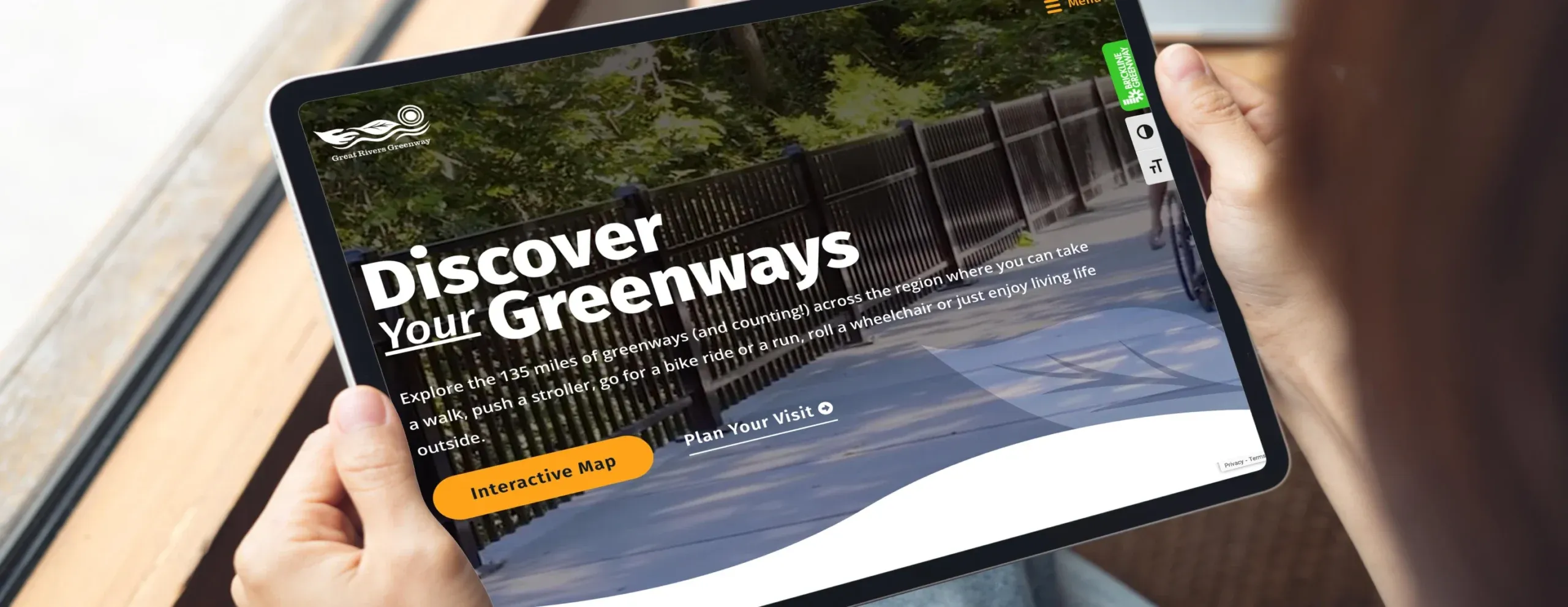 Great Rivers Greenway website on a tablet: “Discover your greenways”